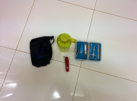 1 nail kit, 1 swiss army knife, 1 water bottle, 1 sleeping bag liner